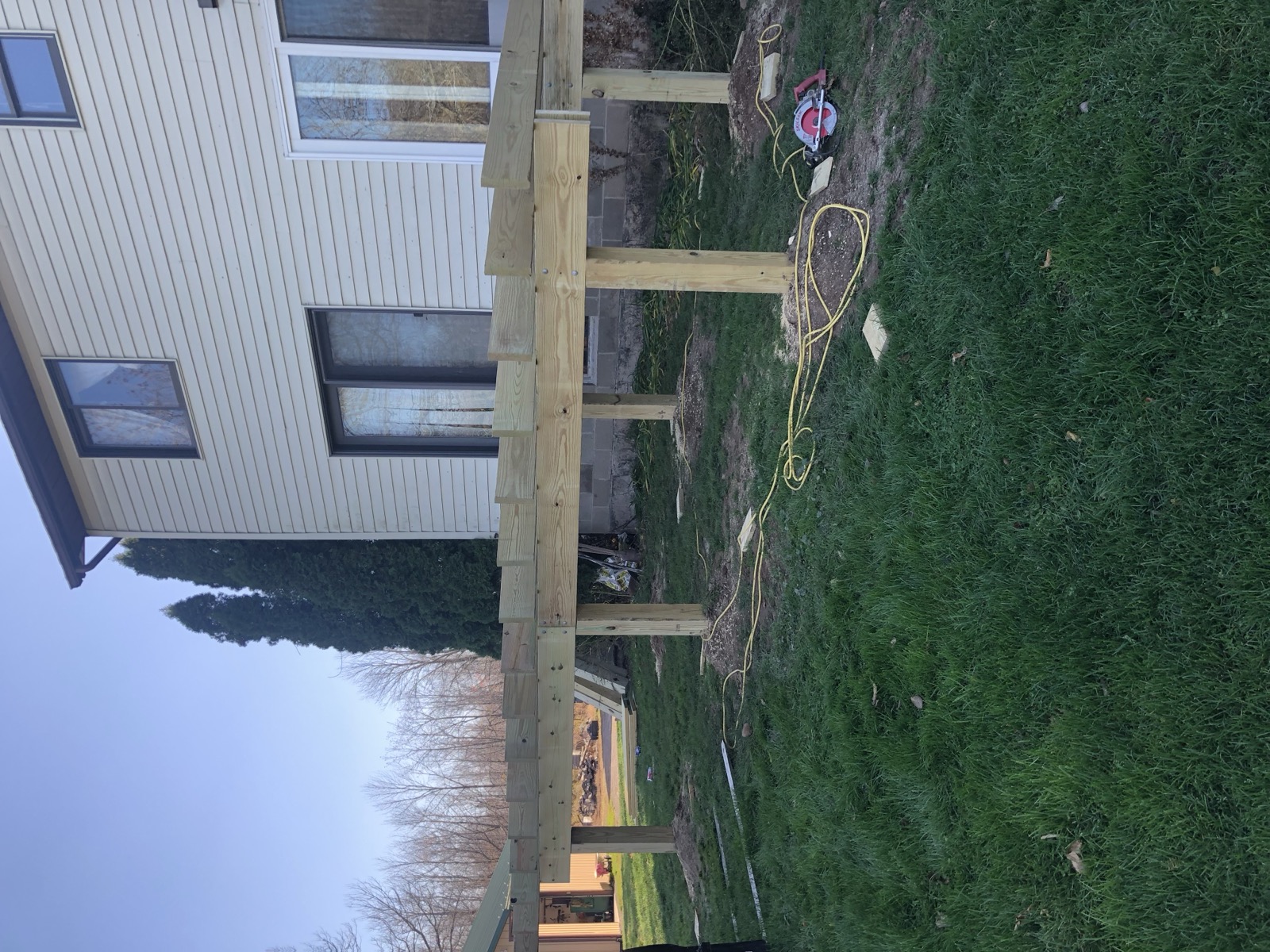 Elevated deck framing construction